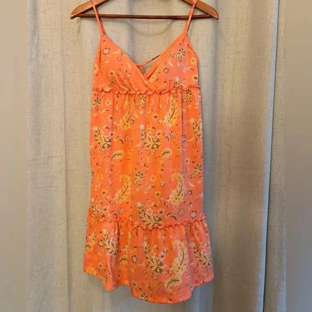 “So” Mini Sundress. Size XS (Junior). Coral /Peach‎ and floral design.